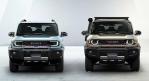 “2025 Toyota FJ Cruiser compact off-roader with rugged design and retro headlights, parked on mountain terrain under clear sky”