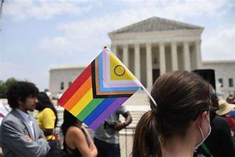 The U.S. Supreme Court building in Washington, D.C., with a rainbow flag overlay symbolizing the ongoing battle for same-sex marriage rights