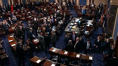 U.S. Senate chamber with a roll-call vote board showing 60-40, spotlighting eight Democrats who backed the funding measure.