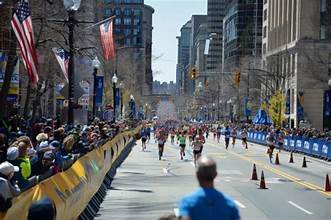 “Spectators cheering runners during the Charlotte Marathon 2025 in South End.”