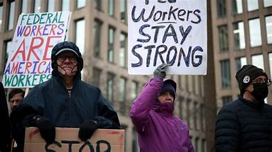 Federal workers and citizens protesting outside the Capitol demanding resolution to government shutdown.