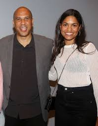 Alexis Lewis in an elegant wedding gown at her intimate ceremony with Senator Cory Booker.