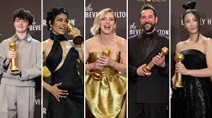Actors holding trophies among the golden globe winners 2026